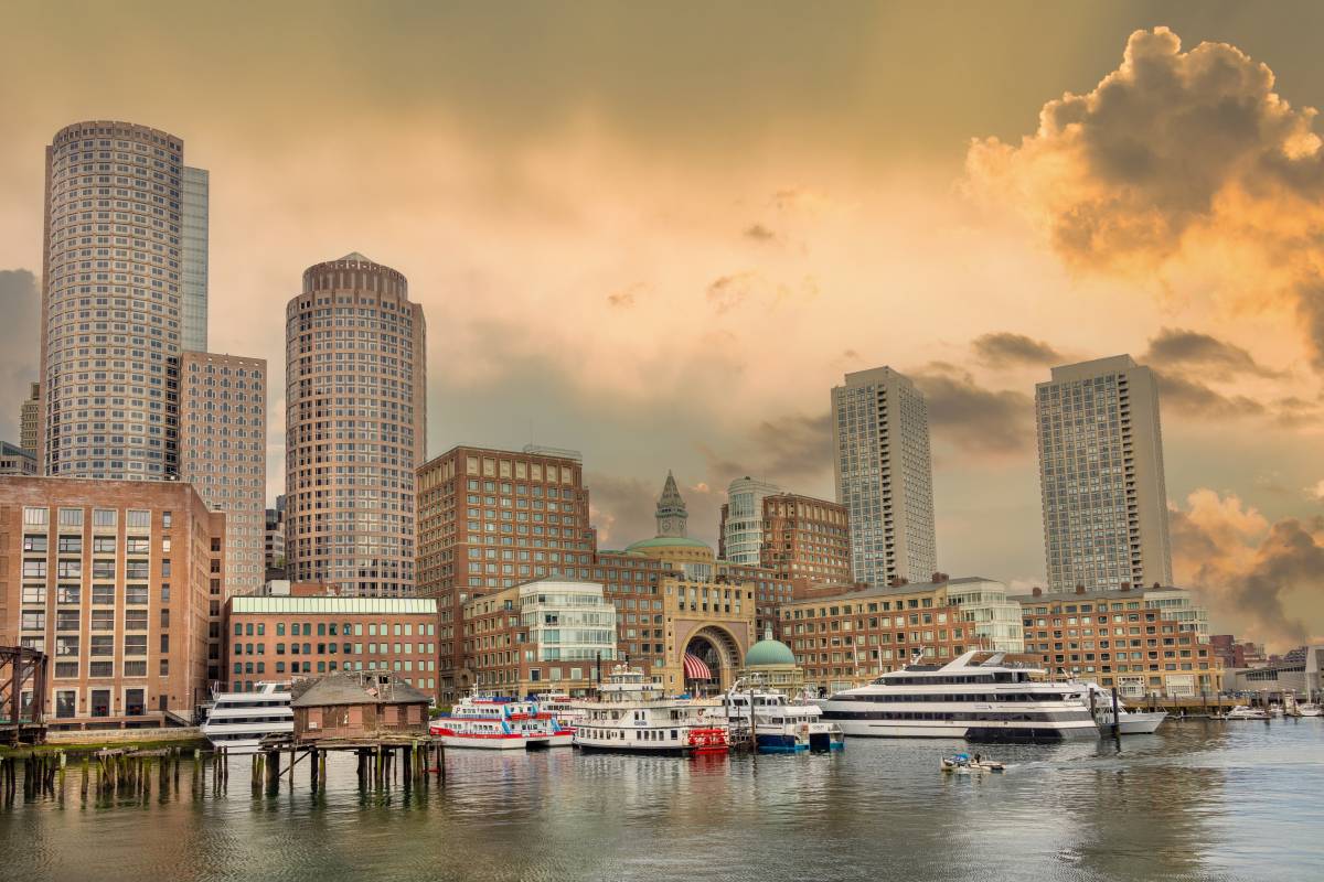 Skyline photo of Boston, Massachusetts, with the harbor in the foreground